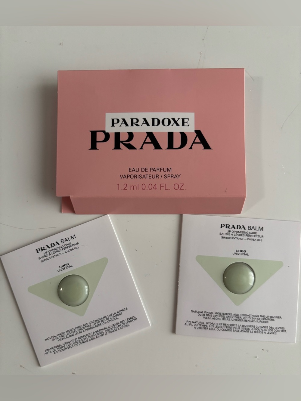 NWT Prada Lip Optimizing Care Balm (Universal U000) & PARADOXE vial set.
